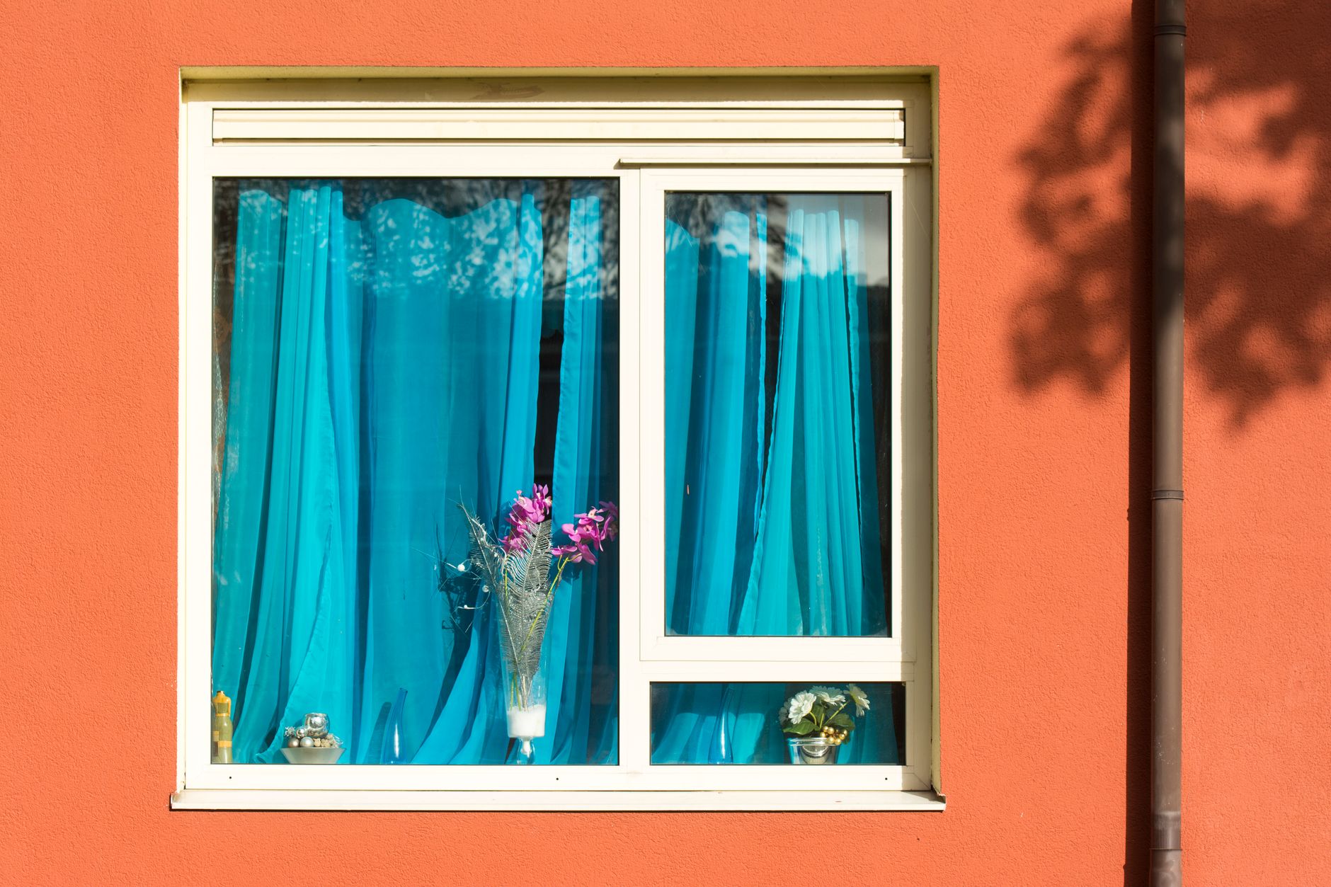 blue curtain in window