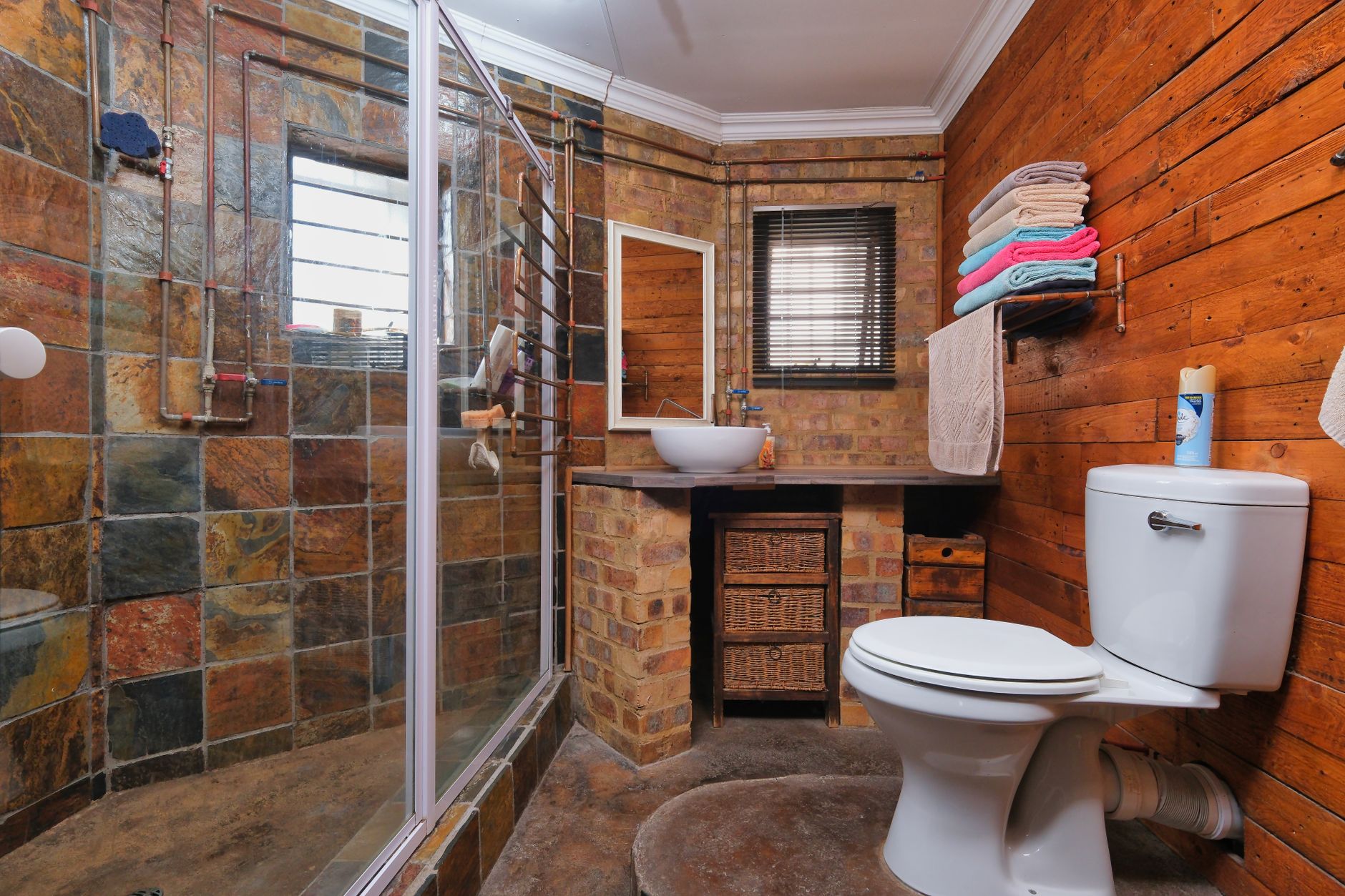 Basement Bathroom Design made with brick and wood