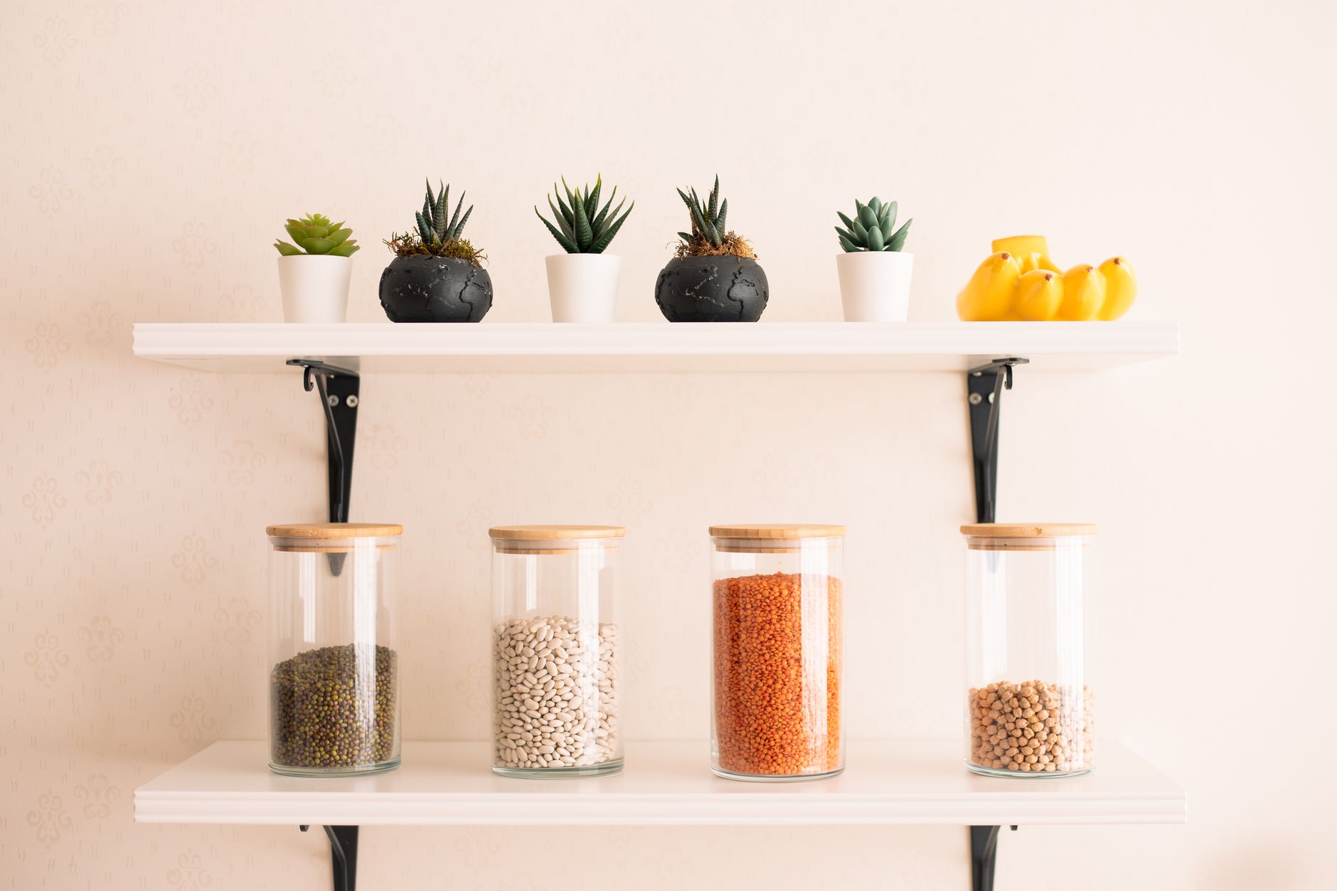 Organized pantry featuring clear storage containers and labels