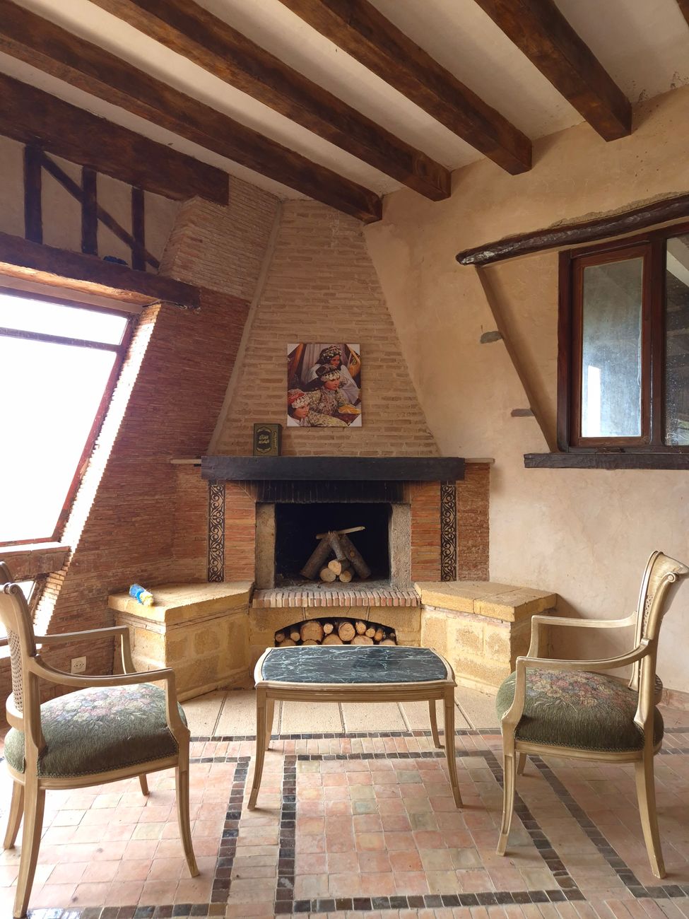 cozy rustic living room with fireplace