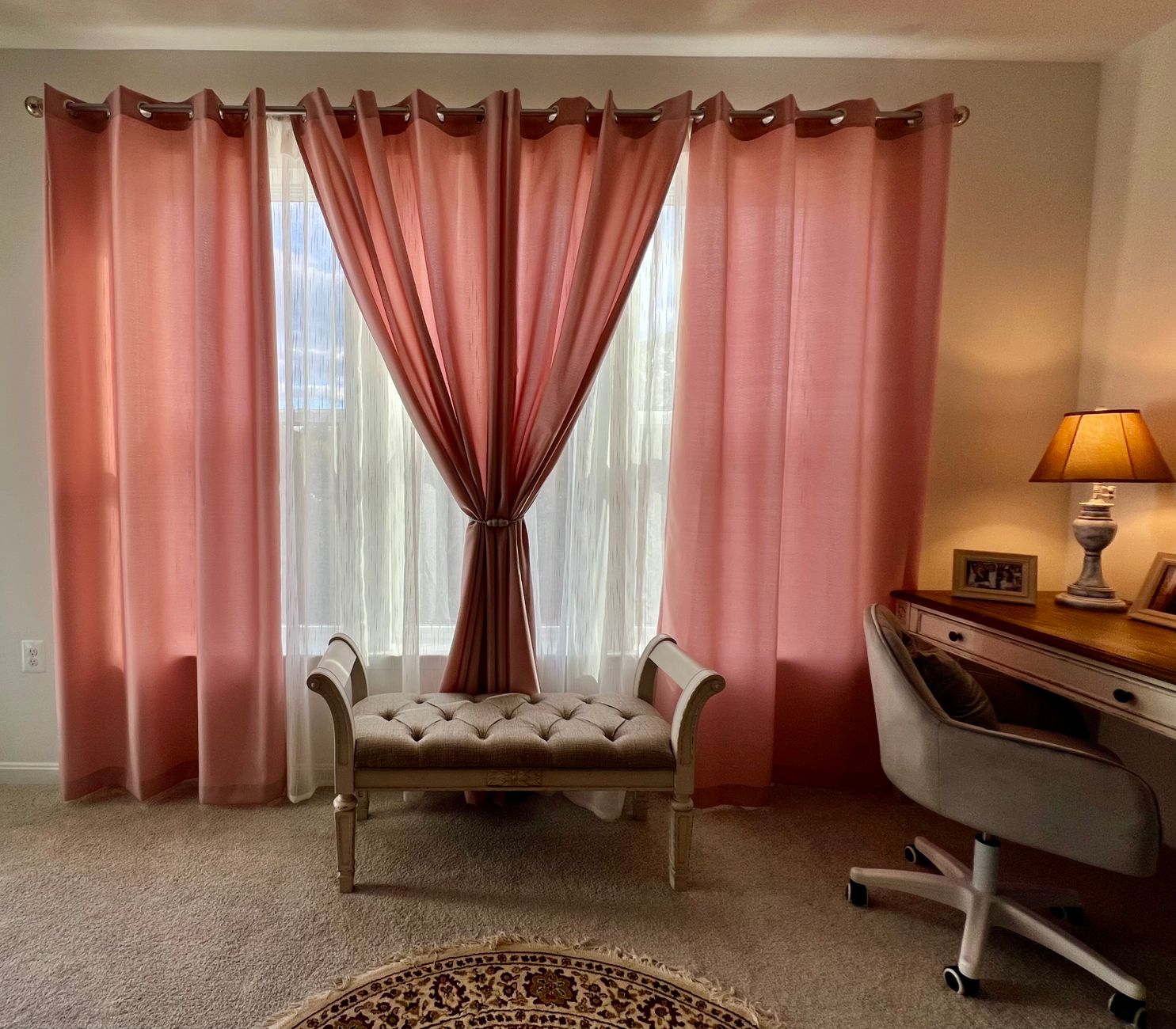 elegant interior with pink curtains and desk