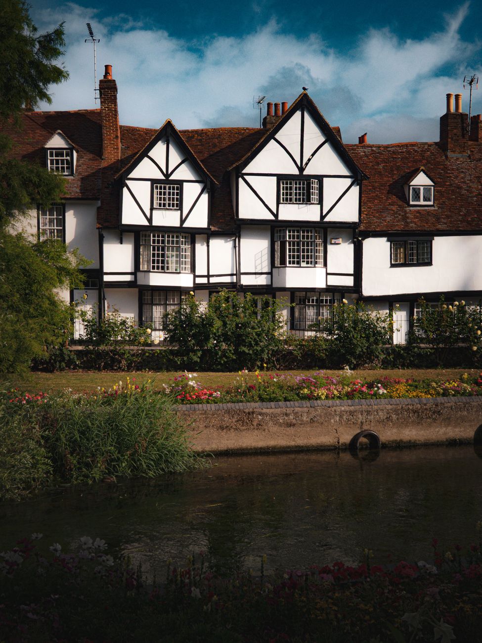charming tudor style house by a serene river