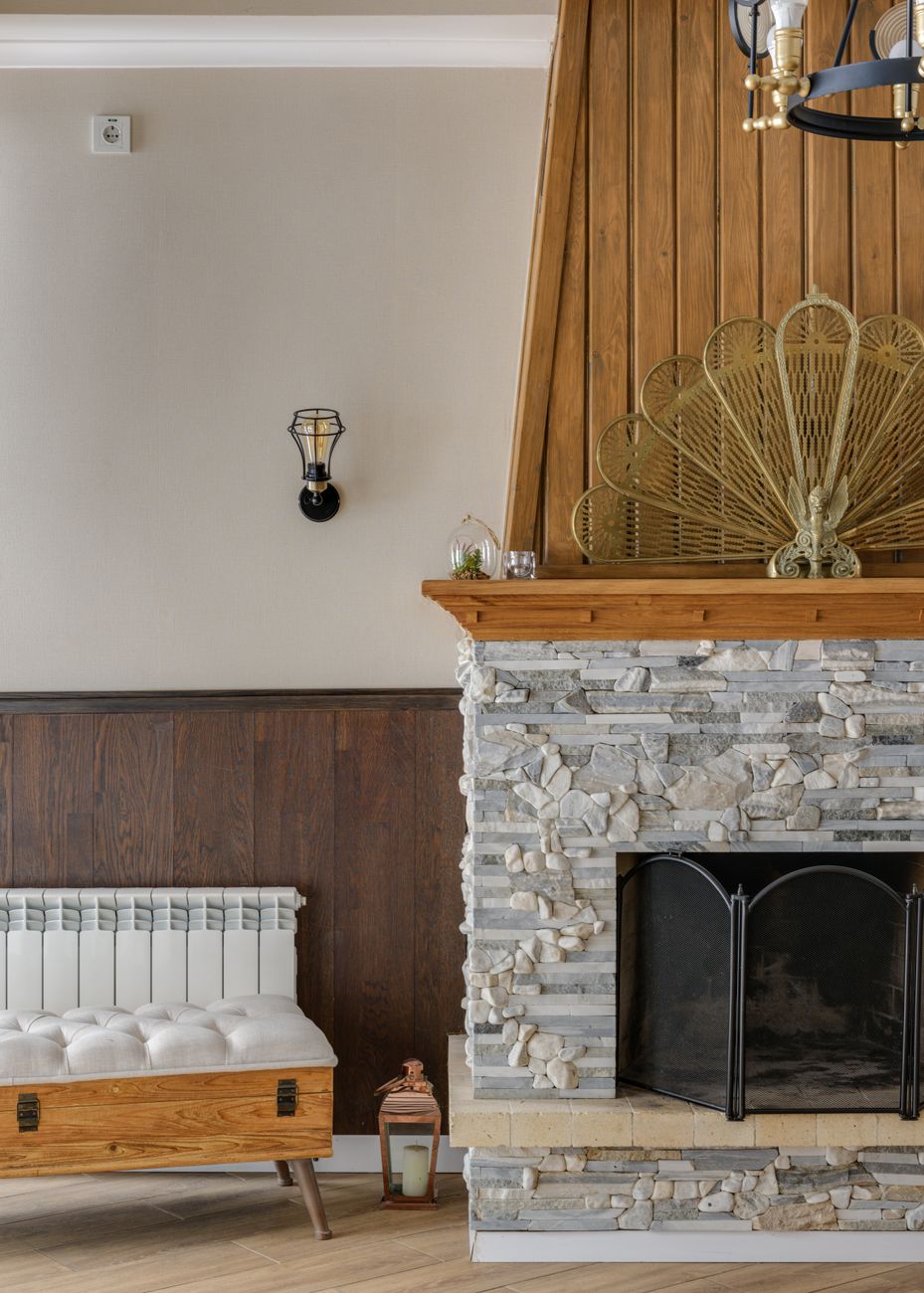 brick fireplace with metal cover