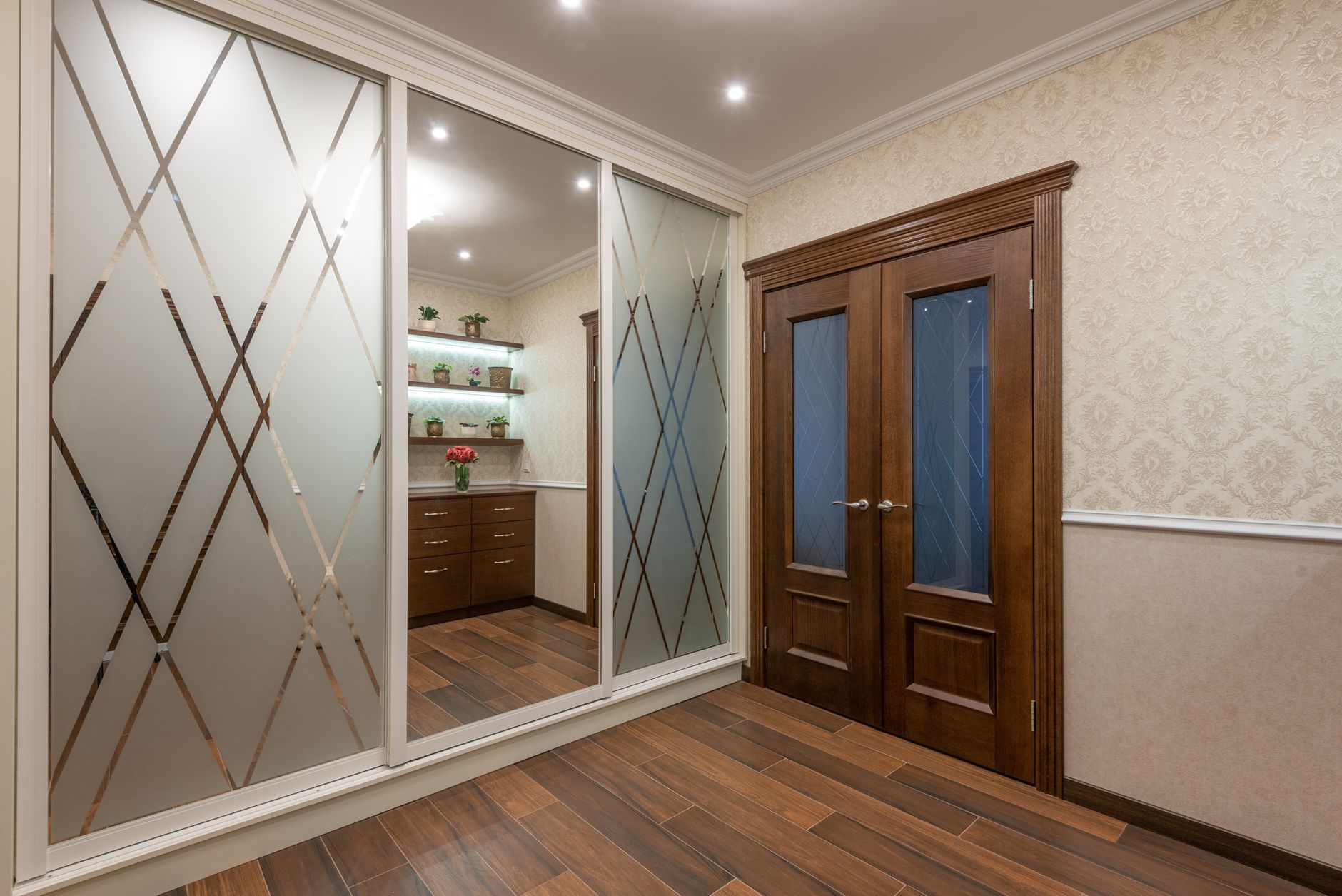 a wooden door near the mirror