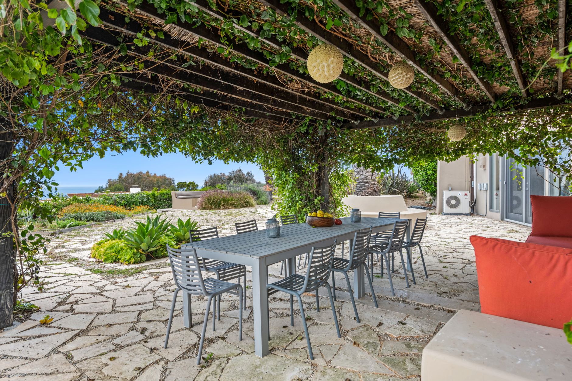 table under a roof in a garden