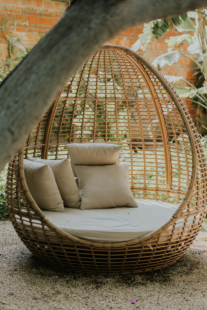 cozy outdoor wicker egg chair with cushions