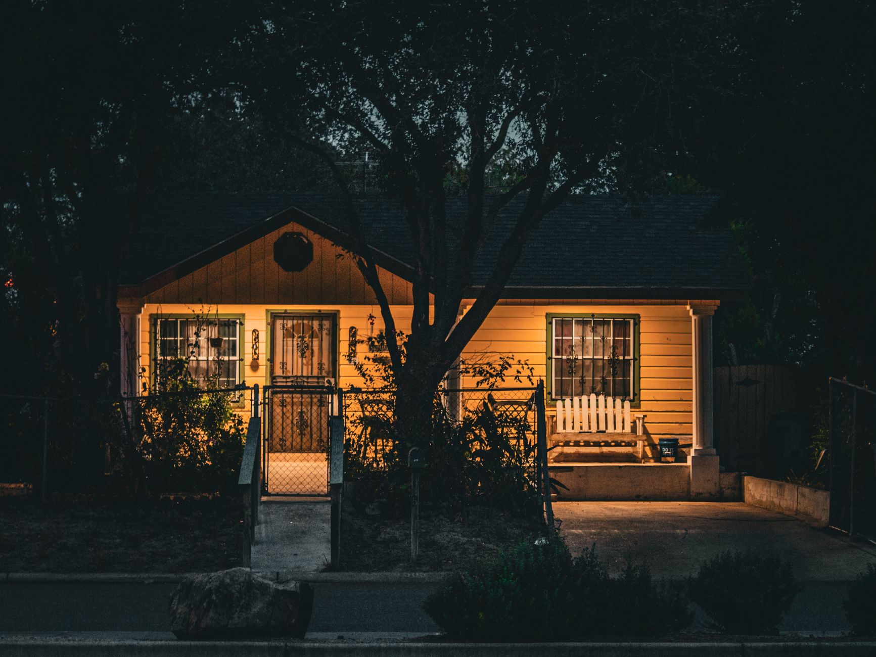 charming texas home illuminated at night