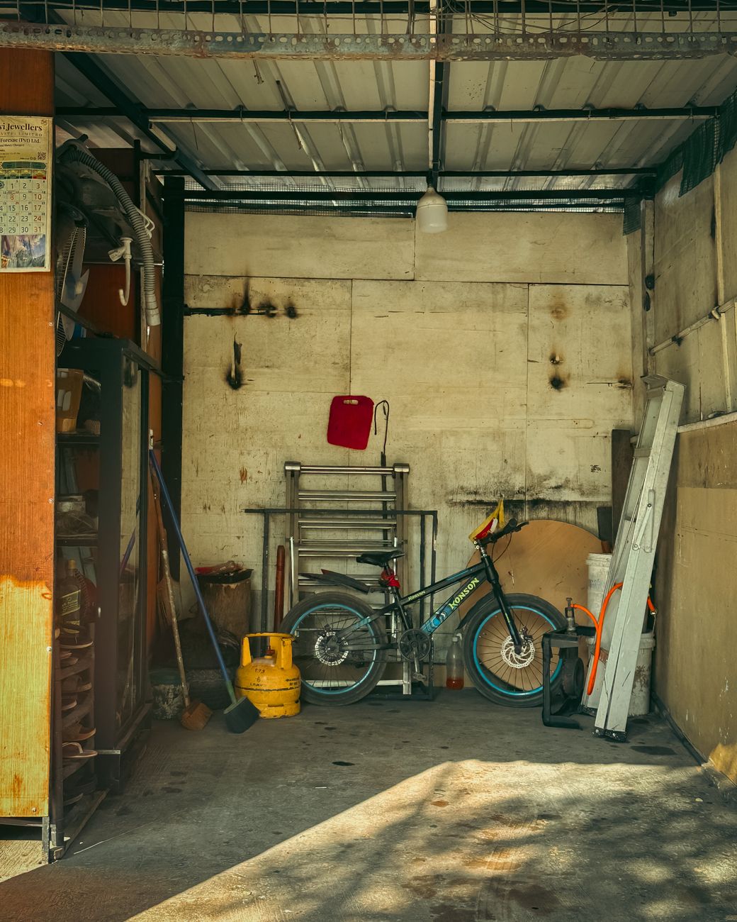 organized garage interior with bicycle and tools