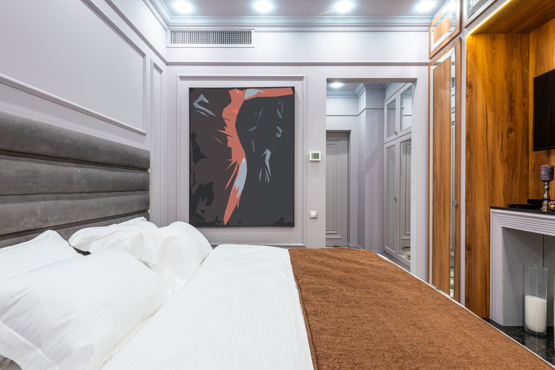 modern bedroom interior with painting against soft bed