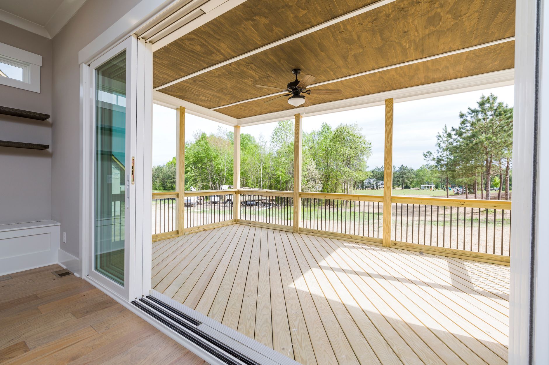 Modern Covered Deck With Glass Railings