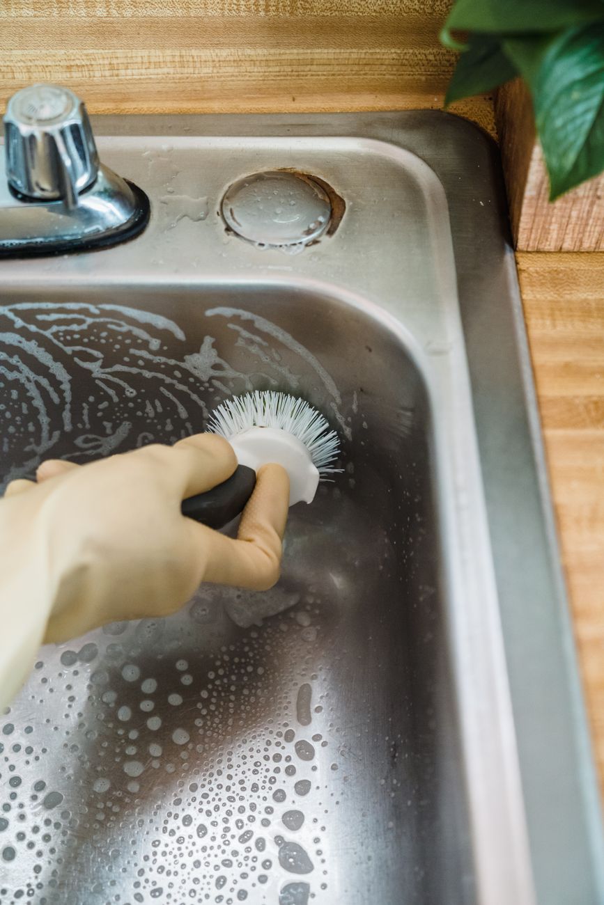 close up of cleaning the sink